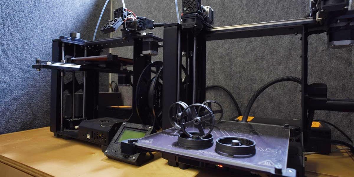 Two engineers discussing a product design concept in manufacturing facility